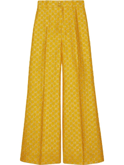 Shop Gucci Gg Lamé Wide Leg Trousers In Yellow