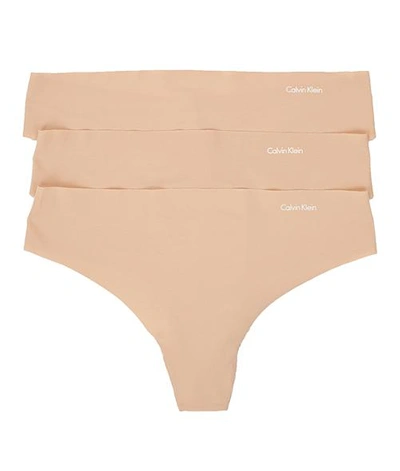 Shop Calvin Klein Invisibles Thong 3-pack In Light Caramel