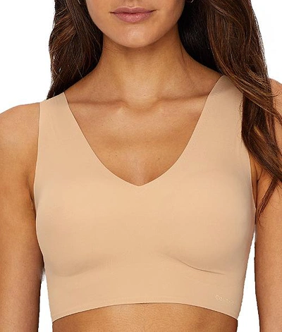 Shop Calvin Klein Invisibles Smoothing Longline Bralette In Bare