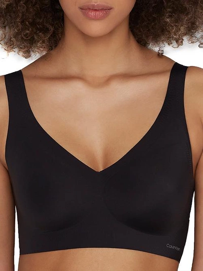 Shop Calvin Klein Invisibles Lift Plunge Bralette In Black