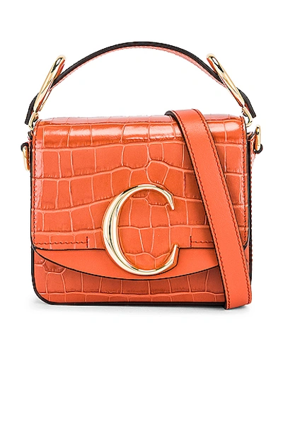 Shop Chloé Mini C Embossed Croc Box Bag In Tawny Orange
