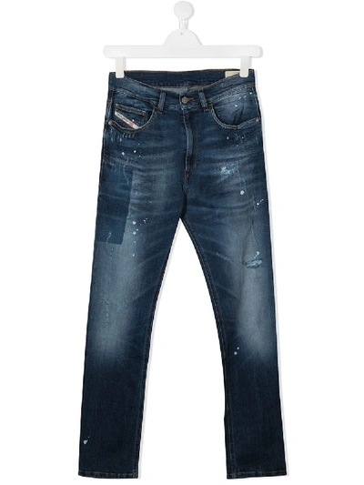 Shop Diesel Teen Eetar Tapered Jeans In Blue