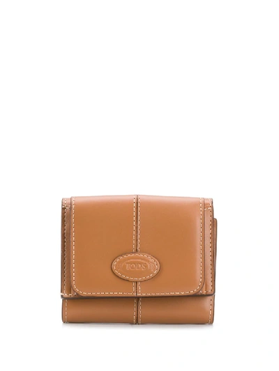 Shop Tod's Trifold Logo Wallet In Brown