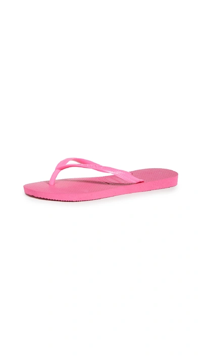 Shop Havaianas Slim Flip Flops In Pink Flux