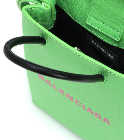Shop Balenciaga Shopping Phone Pouch Leather Tote In Green