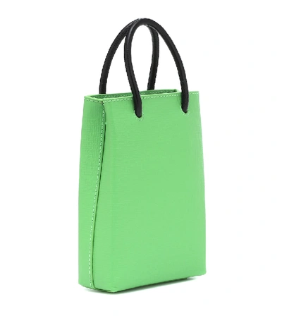 Shop Balenciaga Shopping Phone Pouch Leather Tote In Green