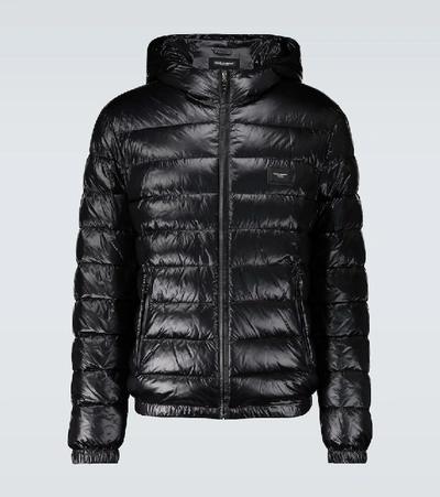 Shop Dolce & Gabbana Shiny Down Jacket With Plaque In Black