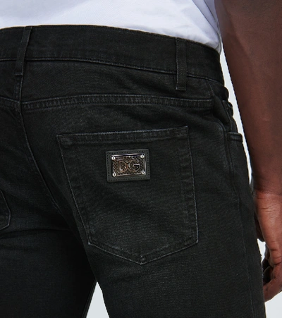Shop Dolce & Gabbana Distressed Skinny Jeans In Black