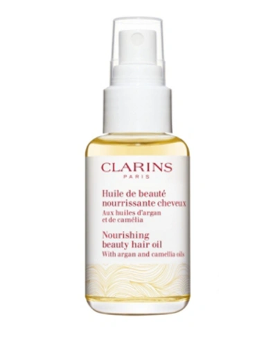 Shop Clarins Nourishing Beauty Hair Oil With Argan And Camellia Oils