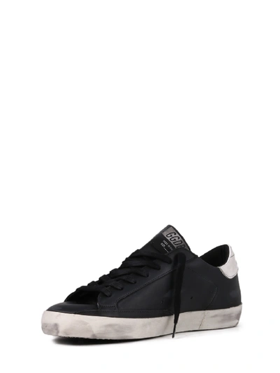 Shop Golden Goose Super-star Sneakers In Black