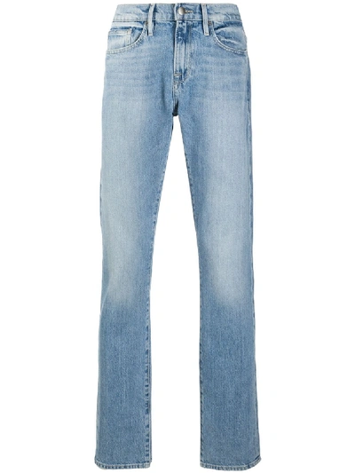 Shop Frame Straight Leg Stonewashed Jeans In Blue