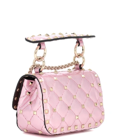 Shop Valentino Rockstud Spike Micro Crossbody Bag In Pink