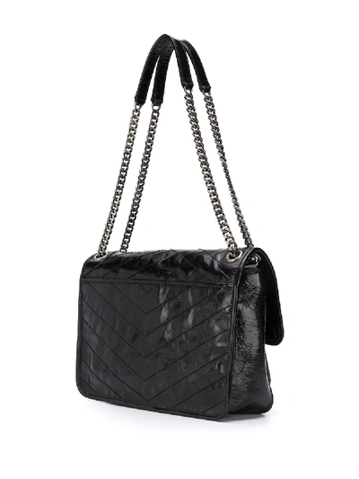 Shop Saint Laurent Niki Leather Handbag In Black