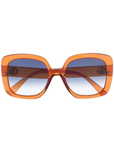 Shop Gucci Sunglasses In Orange