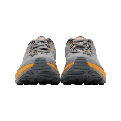 Shop Hoka One One Grey And Orange Stinson Atr 6 Sneakers In Grey/orange