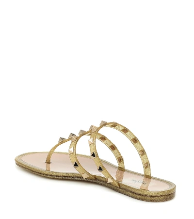 Shop Valentino Rockstud Sandals In Gold