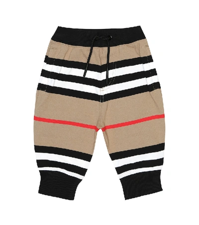 Shop Burberry Baby Icon Stripe Cotton Trackpants In Beige