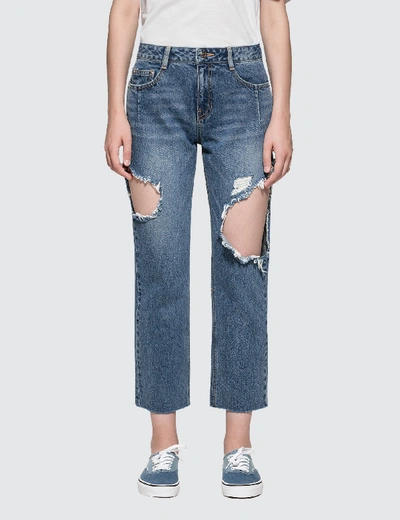 Shop Sjyp Side Cut Off Jeans In Blue