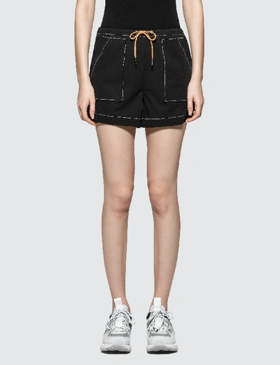 Shop Ganni Cinnober Shorts In Black