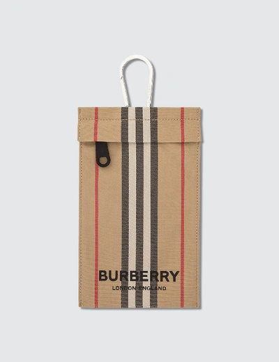 Shop Burberry Iconic Stripe Pouch In Beige