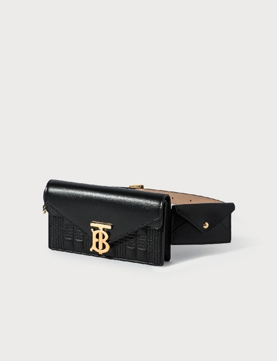 Shop Burberry Belted Quilted Lambskin Tb Envelope Clutch In Black