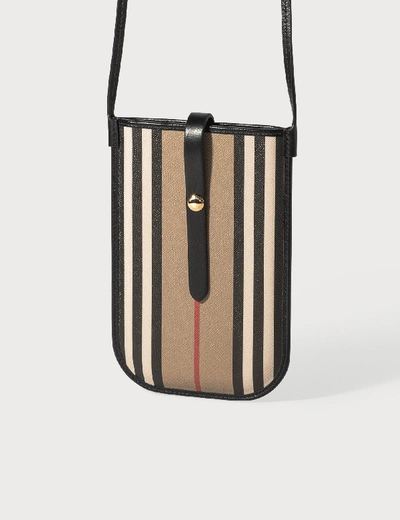 Shop Burberry Icon Stripe E-canvas Phone Case With Strap In Black / Archive Beige