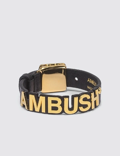 Shop Ambush Leather Nameplate Bracelet In Gold