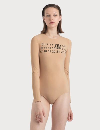 Shop Mm6 Maison Margiela Long Sleeve Jersey Logo Bodysuit In Beige