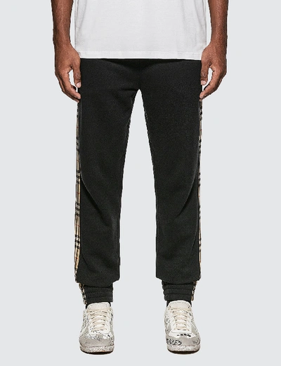 Shop Burberry Vintage Check Panel Cotton Trackpants In Black