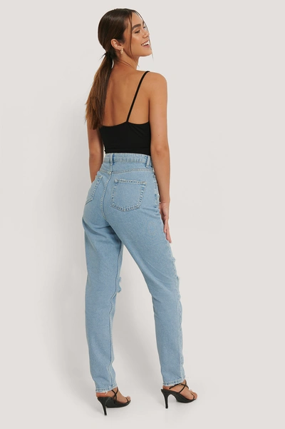 Shop Anika Teller X Na-kd Ripped Knee Jeans - Blue In Mid Blue