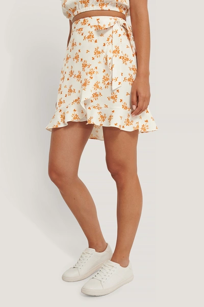 Shop Anika Teller X Na-kd Flounce Overlap Mini Skirt Offwhite In Flower Print