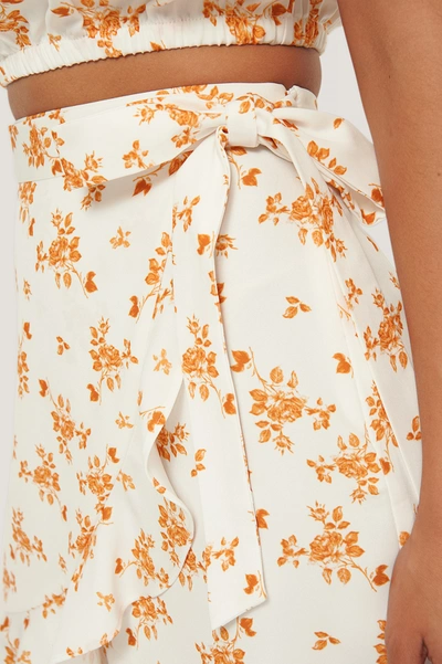 Shop Anika Teller X Na-kd Flounce Overlap Mini Skirt Offwhite In Flower Print