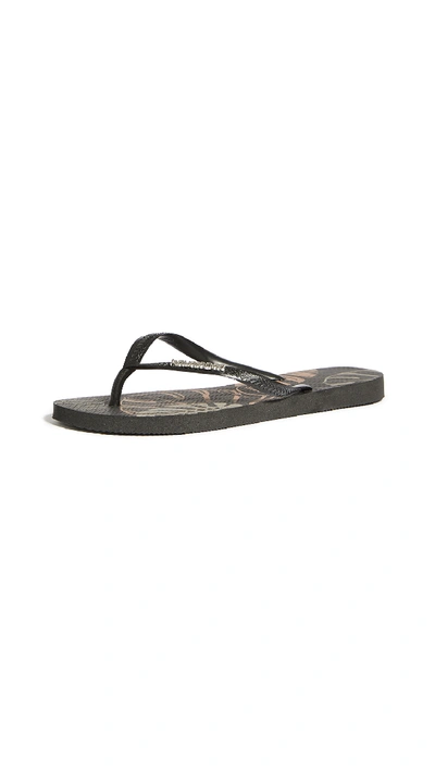 Shop Havaianas Slim Logo Metallic Flip Flops In Black/silver