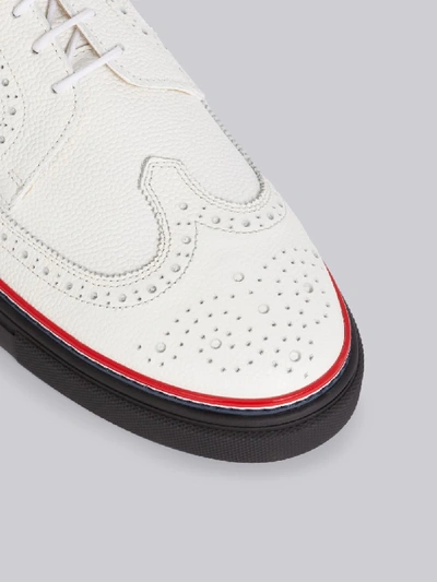 Shop Thom Browne White Pebbled Calfskin Longwing Brogue Trainer