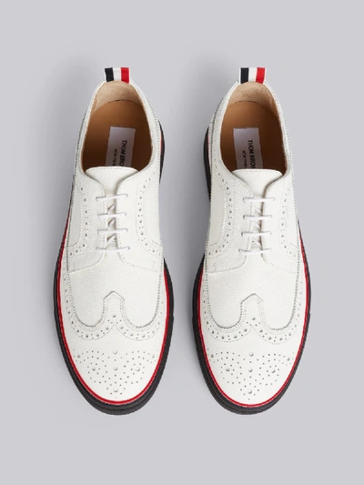 Shop Thom Browne White Pebbled Calfskin Longwing Brogue Trainer