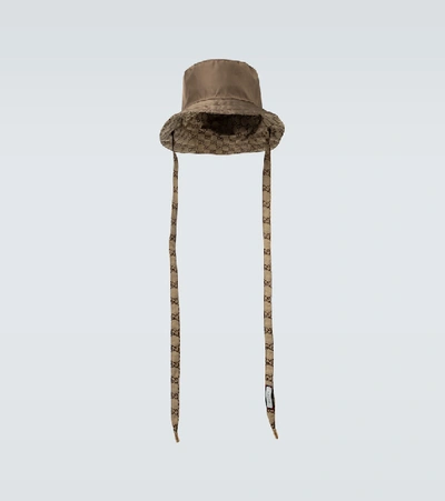 Shop Gucci Gg Reversible Bucket Hat In Brown
