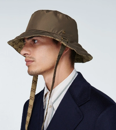 Shop Gucci Gg Reversible Bucket Hat In Brown