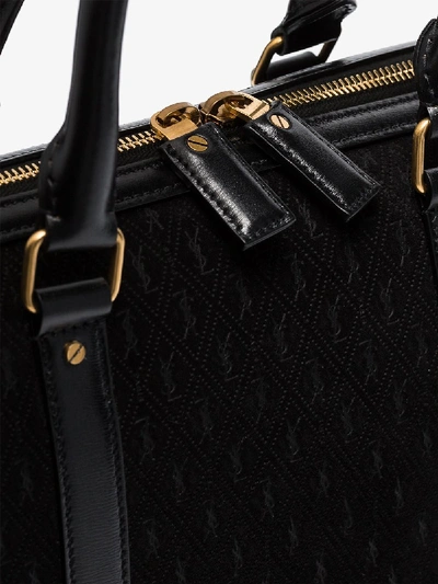 Shop Saint Laurent Black Monogram Embossed Leather Tote Bag