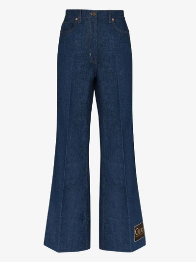 Shop Gucci Blue Logo Patch Flared Jeans