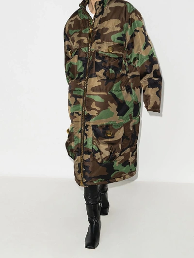 Shop Moschino Oversized Camouflage Print Padded Coat In Green