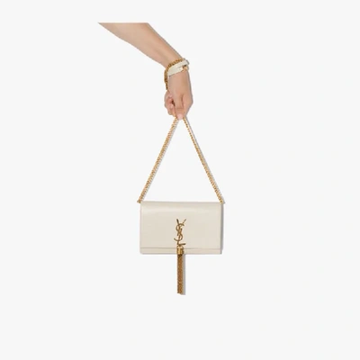 Shop Saint Laurent Cream Kate Tasselled Leather Clutch Bag In White