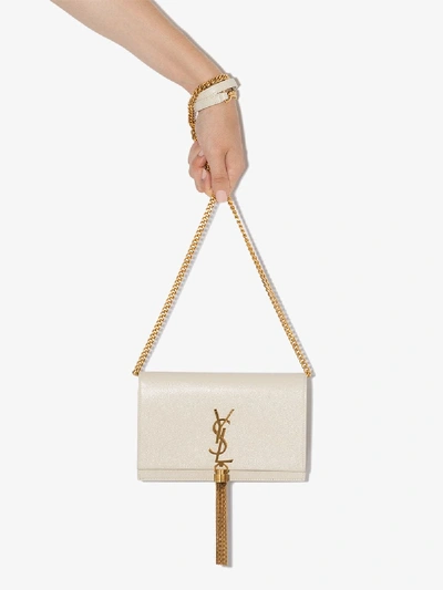 Shop Saint Laurent Cream Kate Tasselled Leather Clutch Bag In White