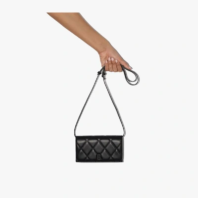 Shop Balenciaga Black Touch Quilted Leather Phone Bag