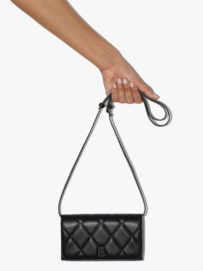 Shop Balenciaga Black Touch Quilted Leather Phone Bag