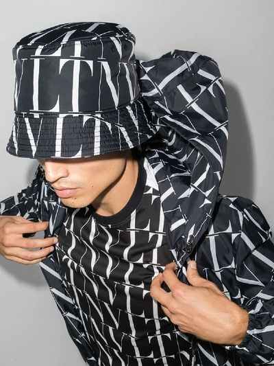 Shop Valentino Black Vltn Logo Print Bucket Hat