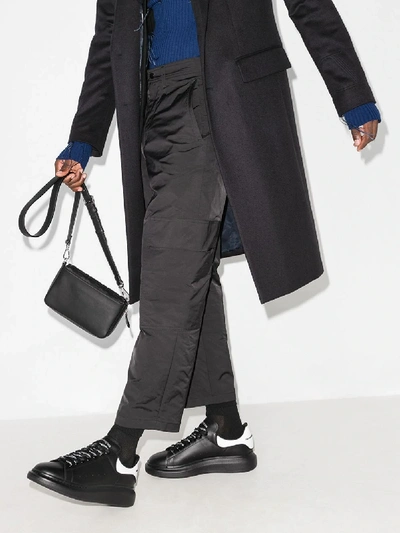 Alexander Mcqueen Exaggerated-sole Rubber-trimmed Leather Sneakers In Black