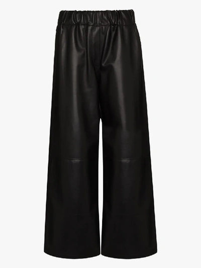 Shop Loewe Cropped Wide Leg Leather Trousers In Black