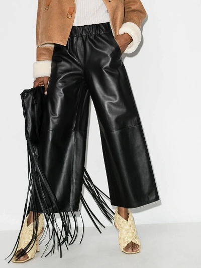 Shop Loewe Cropped Wide Leg Leather Trousers In Black