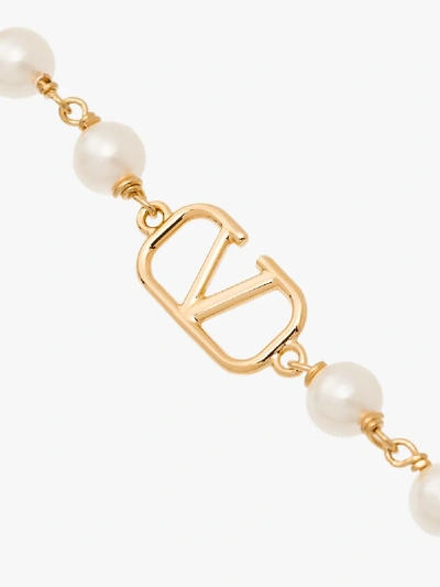 Shop Valentino Gold Tone Vlogo Signature Pearl Bracelet In White