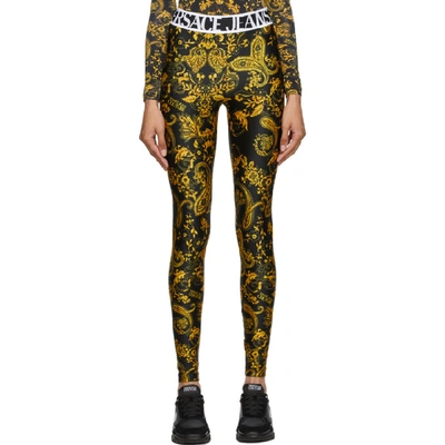 Shop Versace Jeans Couture Black And Gold Paisley Print Leggings In E899 Black